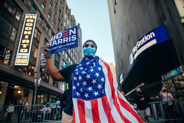 Times Square Cheers for Oval Office-Bound Biden Create Full Circle Moment for Photographer